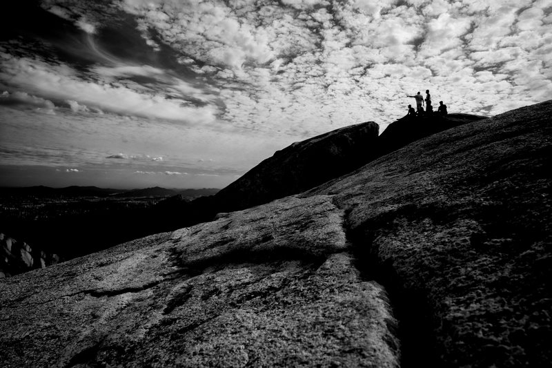 There is a large slab area below the true summit to have a picnic or take pictures