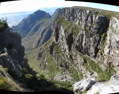 Looking down Plateklip Gorge from one of the overhanging cliffs. Devil's Peak and portions of the Contour Path also visible.