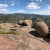 How did those big boulders end up balanced on top of these cliffs?