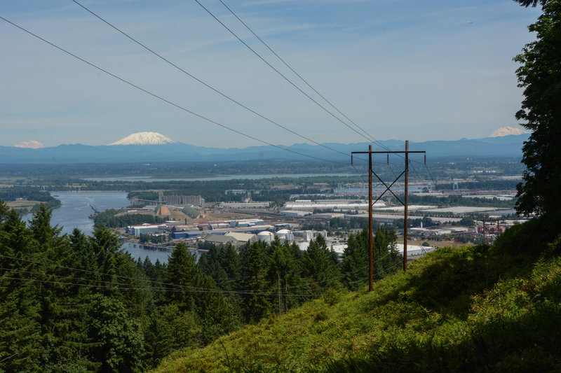 Rainier, Helens, and Adams from the BPA Road Trail, along with the confluence of the Willamette and Columbia Rivers. The power lines are ugly but the views make up for it