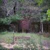 The St. Joseph's Shrine sits in the trees today. It once housed a statue of St. Joseph, the patron saint of Italians, who likely erected much of the Alma College complex.