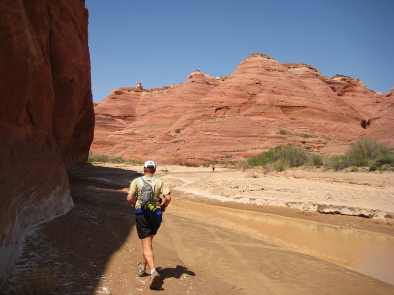 Chris running the shores of the Pariah River.