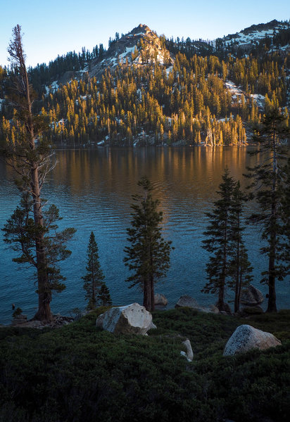 Sun setting on Becker Peak over Lower Echo Lake.