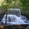 Waterfall over the ruined logging mill