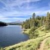 Trail bends around the reservoir and you can see Pikes Peak and Almagre in the distance.