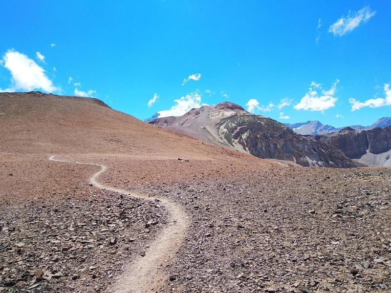 Flowing trail through looking towards Cerro Parva