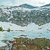 Anona Lake. The lake is very shallow and becomes a meadow later in the season. There are many streams cascading down from the snow melt.