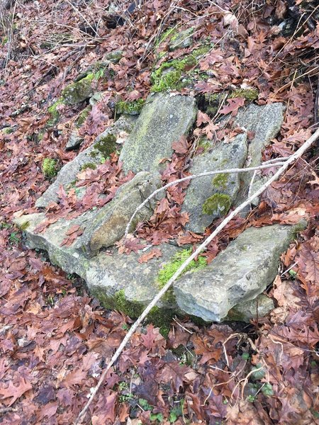 Two-person stone bench along Cliffside Trail.