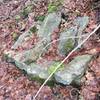 Two-person stone bench along Cliffside Trail.