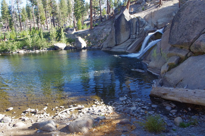 Walking from the top of Lower Rainbow Falls to the top of pond. Water changes every year in volume. Waterfall height about 25 feet. Jumping from top is generally safe ... pond about 11+ feet in depth. Trout fishing is about average.