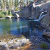 Walking from the top of Lower Rainbow Falls to the top of pond. Water changes every year in volume. Waterfall height about 25 feet. Jumping from top is generally safe ... pond about 11+ feet in depth. Trout fishing is about average.