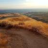 Right before the downhill, great view for sunset.