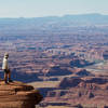The view down to the Colorado River from Dead Horse Point (wife for scale).