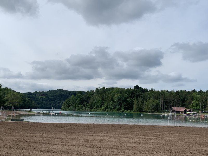 The groomed beach of the well-managed swimming area of Green Lake.