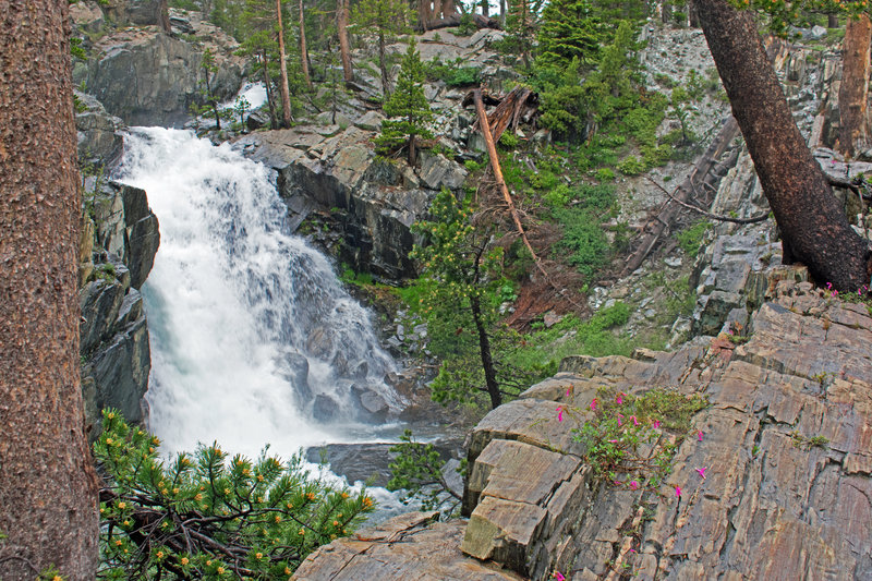 Cascade on River Trail near a large campsite.