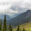 The top of Haystack Butte covered in clouds.