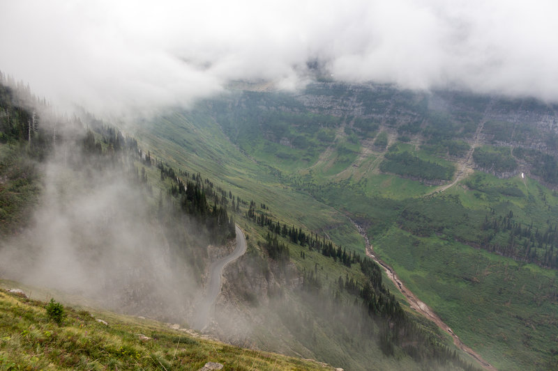 A windy Going-to-the-Sun Road without any traffic due to fire closures.