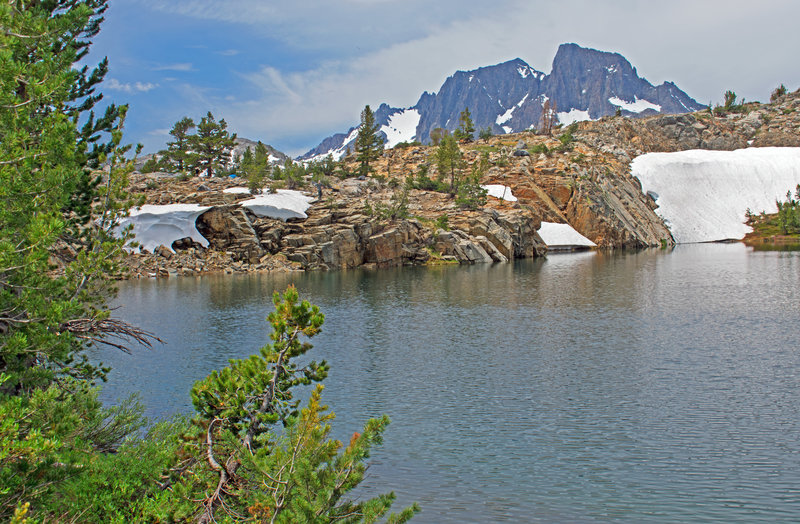 Summit Lake, Banner Peak and Mt. Ritter. Blue spot on left side of ridge above the lake is a tent at an outstanding large campsite.