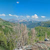 Looking down San Joaquin River canyon with San Joaquin Mountain on the left and the Ritter Range on the right. Mammoth Crest is in the center with the Silver Divide behind it. Badger Lake is on the right.