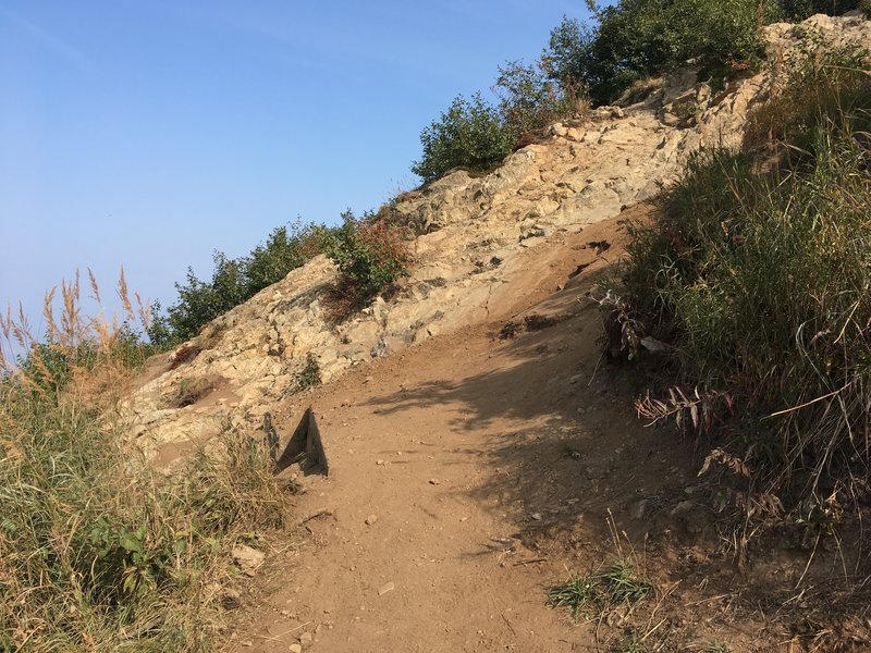 This is the most difficult part of the easy way up and down. As the trail intersects the rock, climb up at a 45-degree angle and find the continuation of the easy up and down trail.