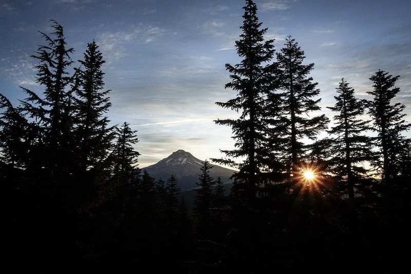 Sun rising near Mt. Hood from Devils Peak Lookout.