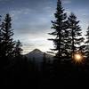 Sun rising near Mt. Hood from Devils Peak Lookout.