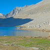 Summit Lake. Even in person, the distances are deceiving. The lake is actually 0.25 miles long and it is 0.5 miles to Mono Pass at the top of the snow bank.