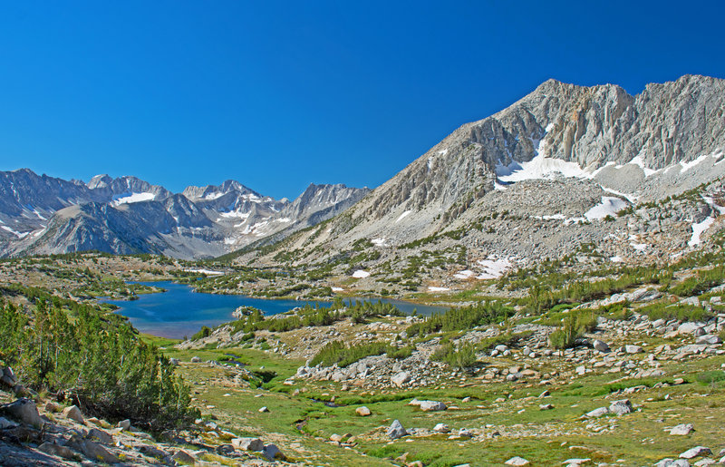 Largest of Pioneer Basin Lakes. Taken from the climb to 6th and 7th lakes. The Third Recess is in the left center with Mt. Mills behind it. The Fourth Recess is on the extreme left.