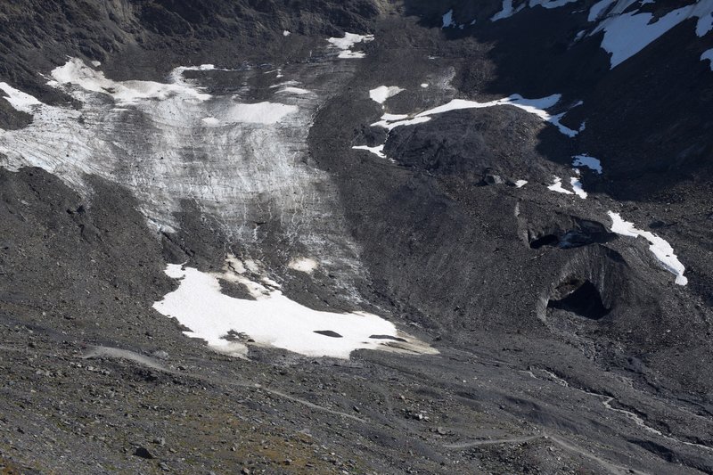 Snow remaining the Glacier Bowl. You can see the bridges created by the melting snow.