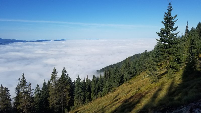 Lake Pend Oreille under a layer of morning fog.