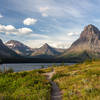 Never Laughs Mountain, Grizzly Mountain, Painted Tepee Peak, and Sinopah Mountain (left to right) with Two Medicine Lake in the front