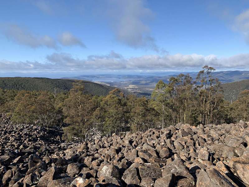 Views of the ocean and the city of Hobart while crossing the Potato Fields.