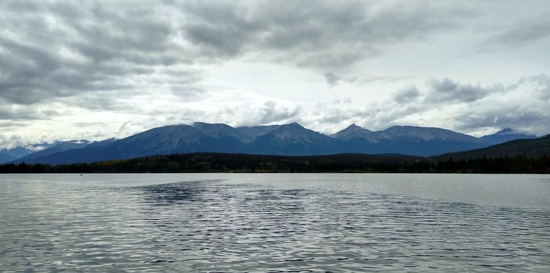 Mountains to the south-southwest, looking across Pyramid Lake from Pyramid Island - (left to right) Whistlers Summit, Indian Ridge, unnamed pointy mountain, Muhigan Mountain and Roche Noire. Mt. Edith Cavell is hidden in the clouds at the far left.