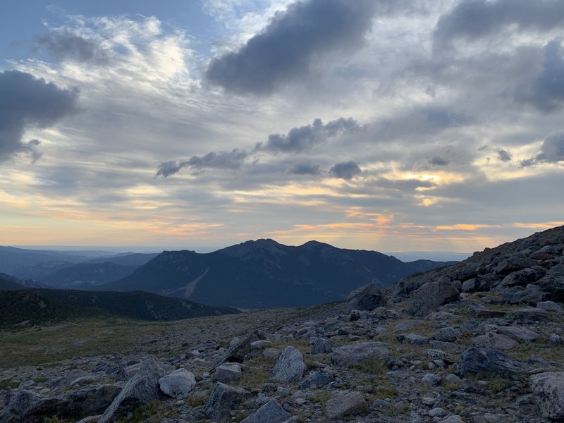 Sunrise at 11,540' on Longs Peak Trail to Chasm Lake, looking east towards the Twin Sisters Peaks. The size of the landslide is clearly visible from here.