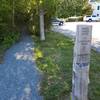 A step off RT 3, hard-packed gravel path marked with blue blazes