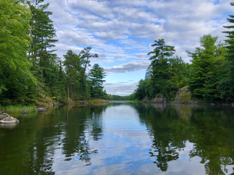 Going through the narrow passageway to Gold Portage Trail on Kabetogama lake in the morning.