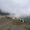 Heading down the ridge from Constance Pass through the clouds.