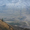 Three mountain goats give scale to Mount Saint Helens (white dots, lower right)