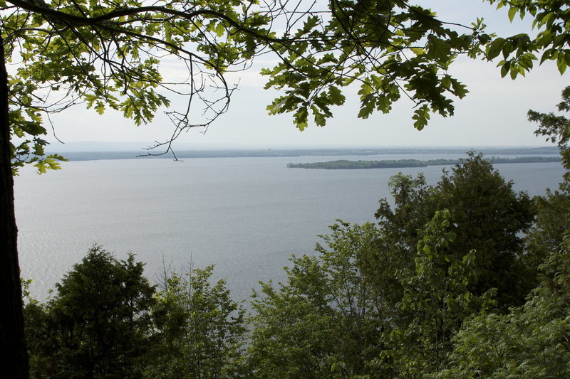 "Lake Champlain from Eagle Mountain's Hoyt Lookout looking towards the Adirondacks" by Michelle (https://www.flickr.com/photos/30387039@N05/) licensed under CC-BY-ND 2.0 (https://creativecommons.org/licenses/by-nd/2.0/)