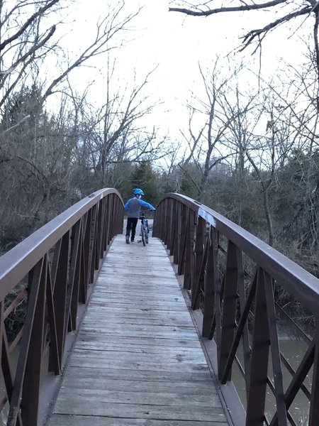 Signage asks that you walk this section of trail in case hiking, biking and equestrians meet up.