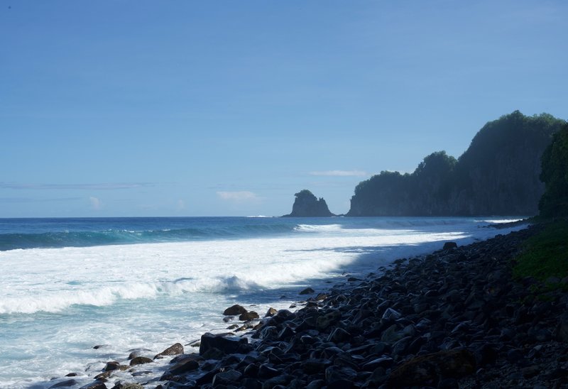 Views of Pola Island from the rocky beach.