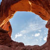 Looking through one of the arches of Double Arch.
