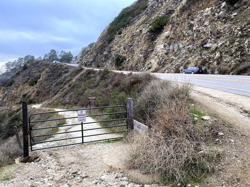 The Partington Cove trailhead is easy to miss — notice the brown sign behind the gate. I found it by noticing where other people had parked.