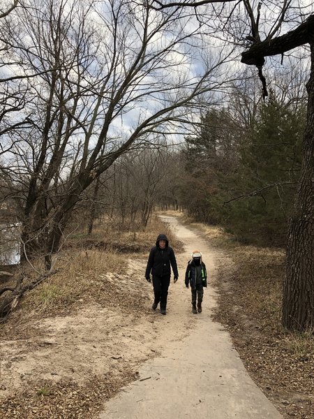 This section of paved path is covered by sand from when the creek was out of it's banks over the summer.  Keep this in mind for ADA access.