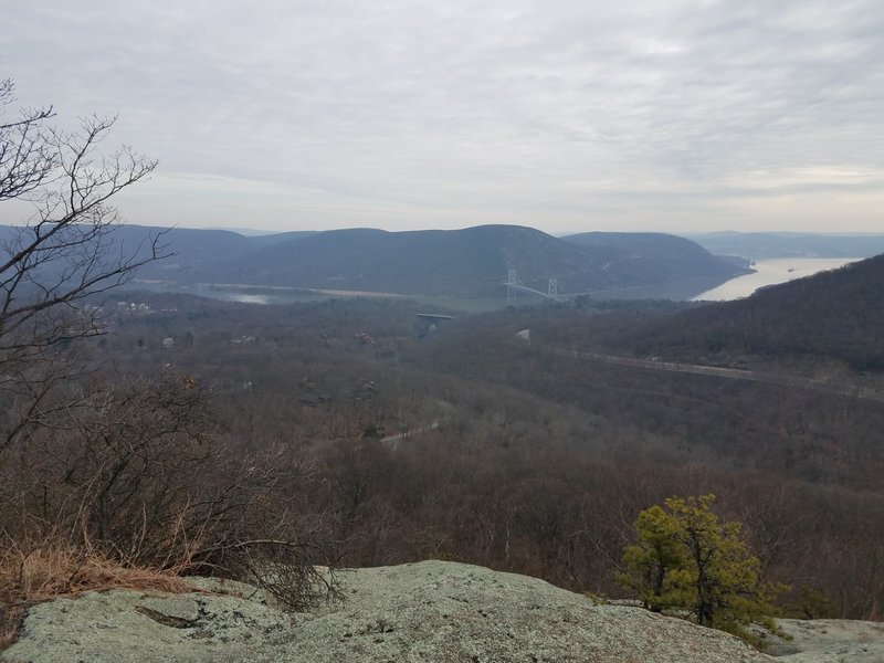 In front of the rock pile overlooking the Bear Mountain Bridge. Great 360 degree view.