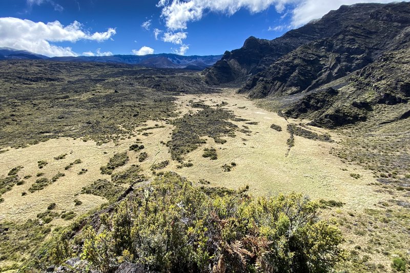 The grasslands at this end of the hike are almost polar opposite to the barren landscape at the start.