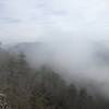 Fog clearing from the valley below.