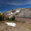 The trail (arrow) continues past one of the Chambers Lakes