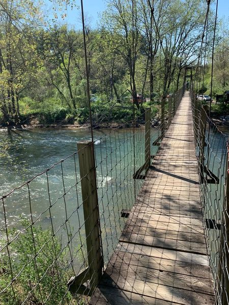 Hike starts and ends using a wobbly bridge over the Maury River.