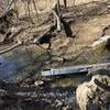 The bridge is washed out.  You can get across here, but there is also a go-around trail that takes you up to the road to get across this creek.